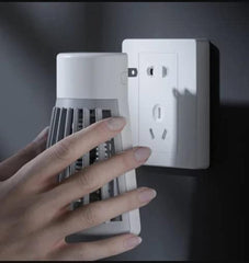 Electric Mosquito Killer Lamp – Plug-in UV Repellent for Home & Travel